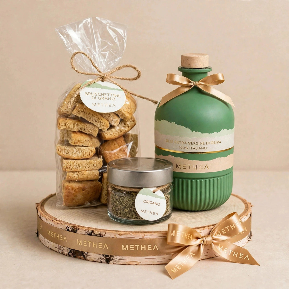 Composizione regalo Methea con olio Gold, bruschettine di grano e origano su base in legno